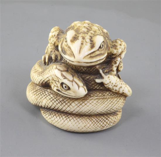 A Japanese ivory netsuke of the sansukumi (snake, frog and snail), 19th century, signed, 4cm (no. 592)